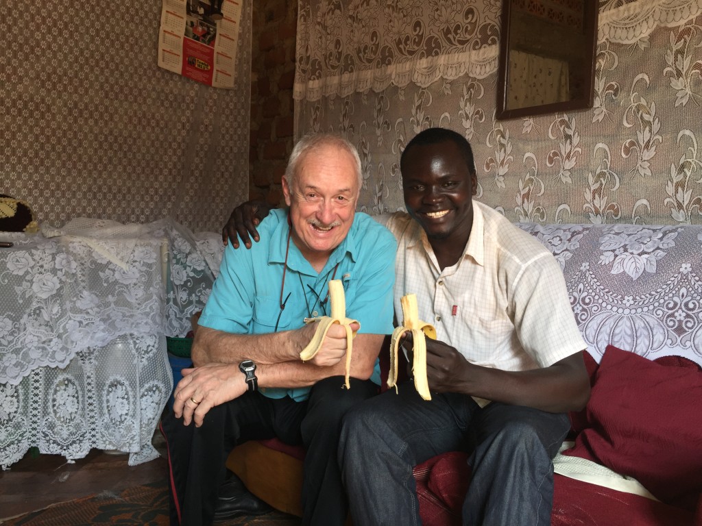 Friends sharing bananas and a glass of wine.