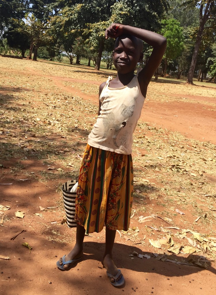 A Young Lady Using a Branch as a Sunshade