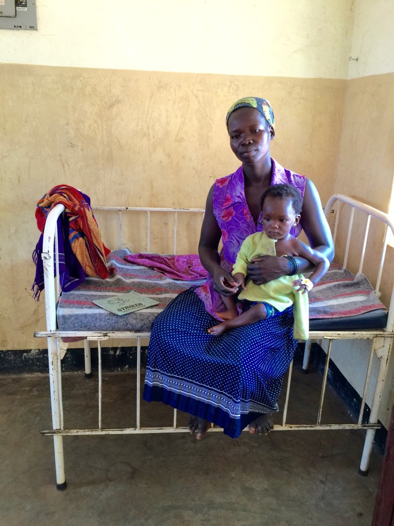 Mother with her small child in the Children's ward.